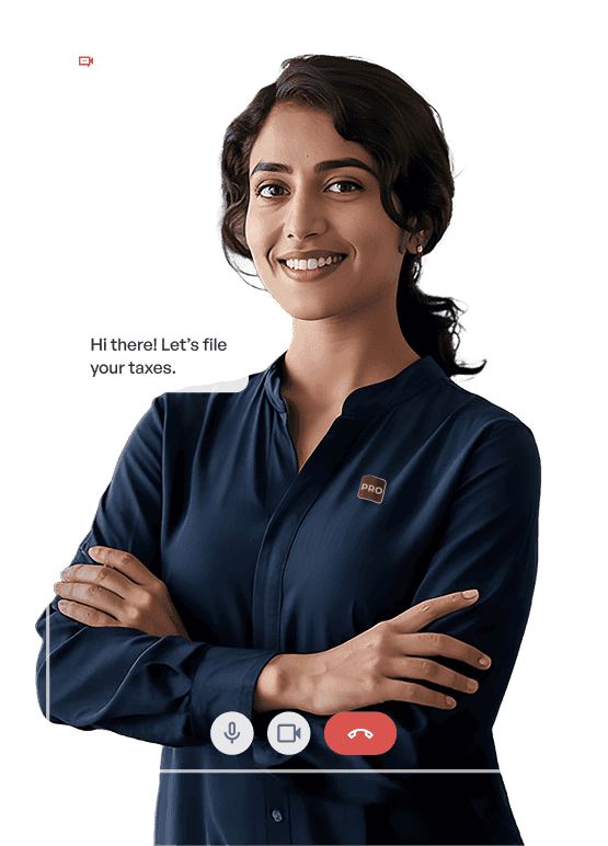 Sneha, a tax expert, standing in her office workspace.
