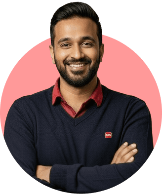 A smiling tax expert in a collared shirt